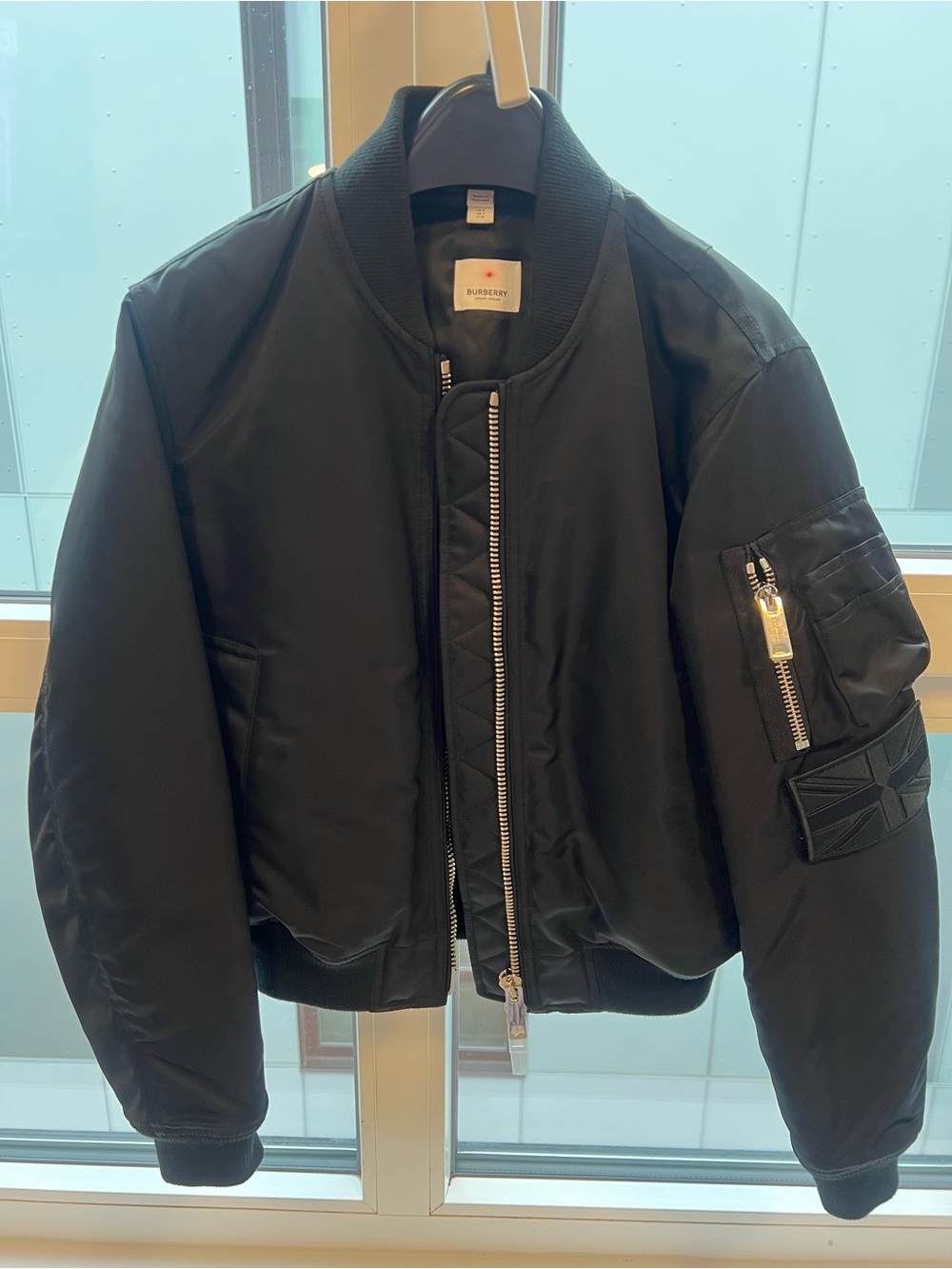Burberry Black Women’s Bomber Jacket with Ribbed Collar.